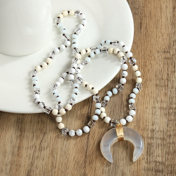 Collier avec pendentif croissant de corne de bœuf en perles de cristal naturel Olivenorma