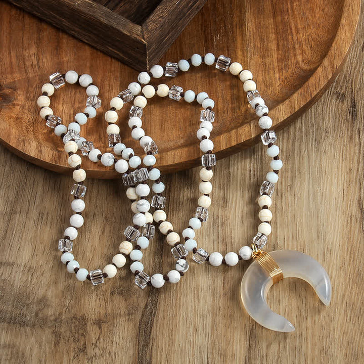 Collier avec pendentif croissant de corne de bœuf en perles de cristal naturel Olivenorma