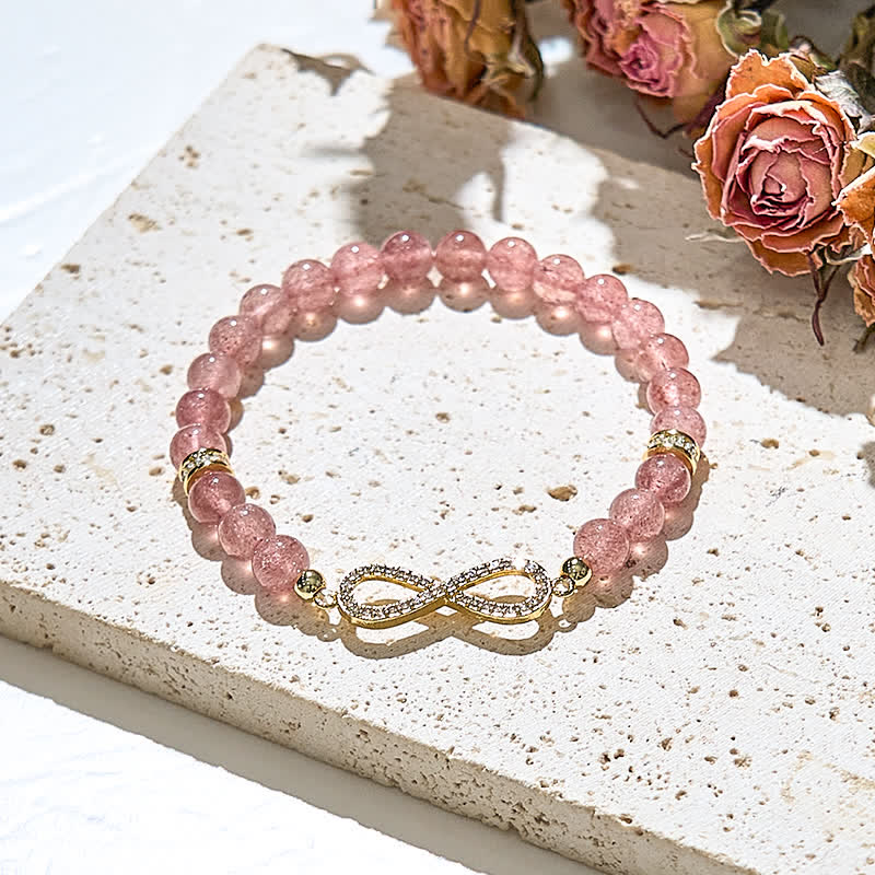 Bracelet symbole infini en perles de quartz fraise naturel Olivenorma