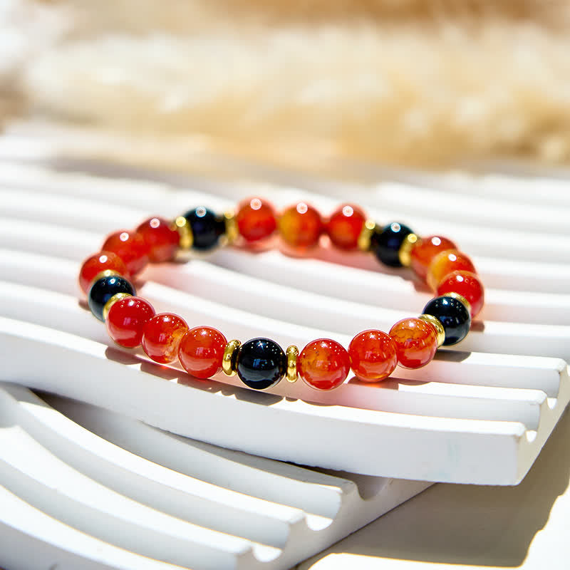 Bracelet en perles de quartz rubis naturel et onyx noir Olivenorma
