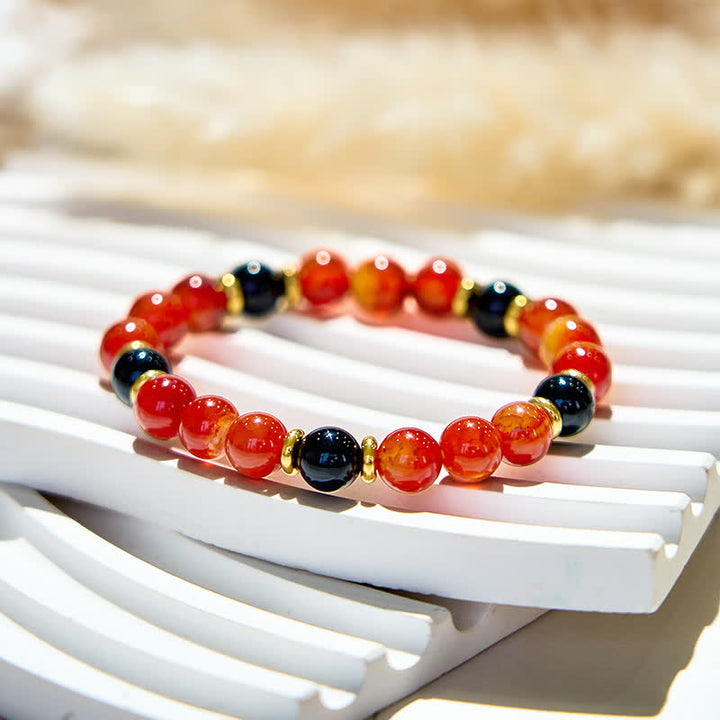 Bracelet en perles de quartz rubis naturel et onyx noir Olivenorma