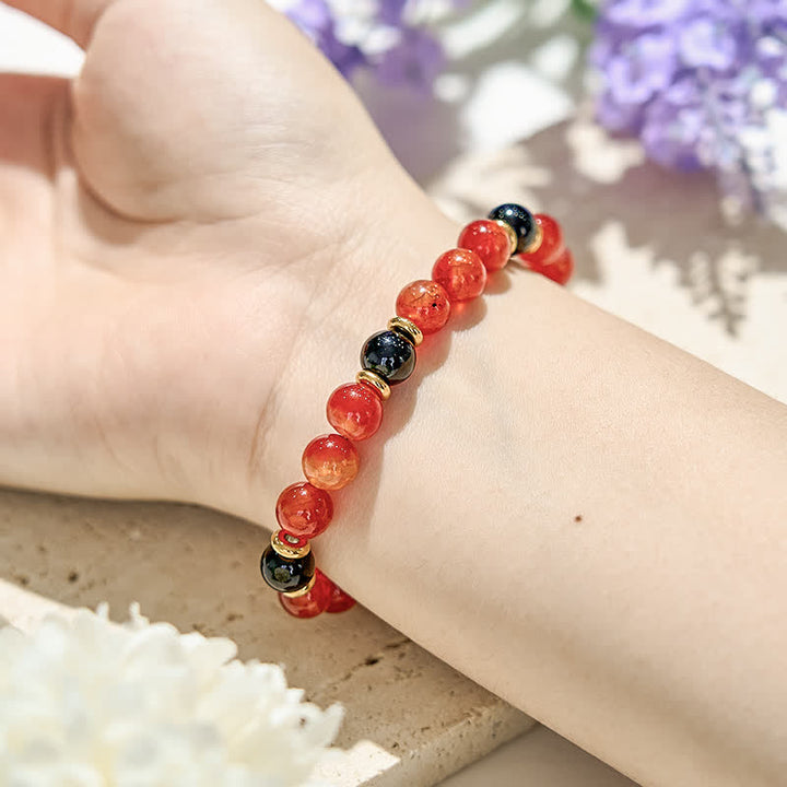 Bracelet en perles de quartz rubis naturel et onyx noir Olivenorma