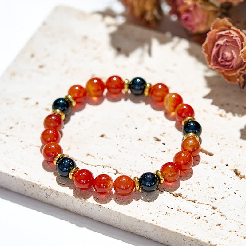 Bracelet en perles de quartz rubis naturel et onyx noir Olivenorma