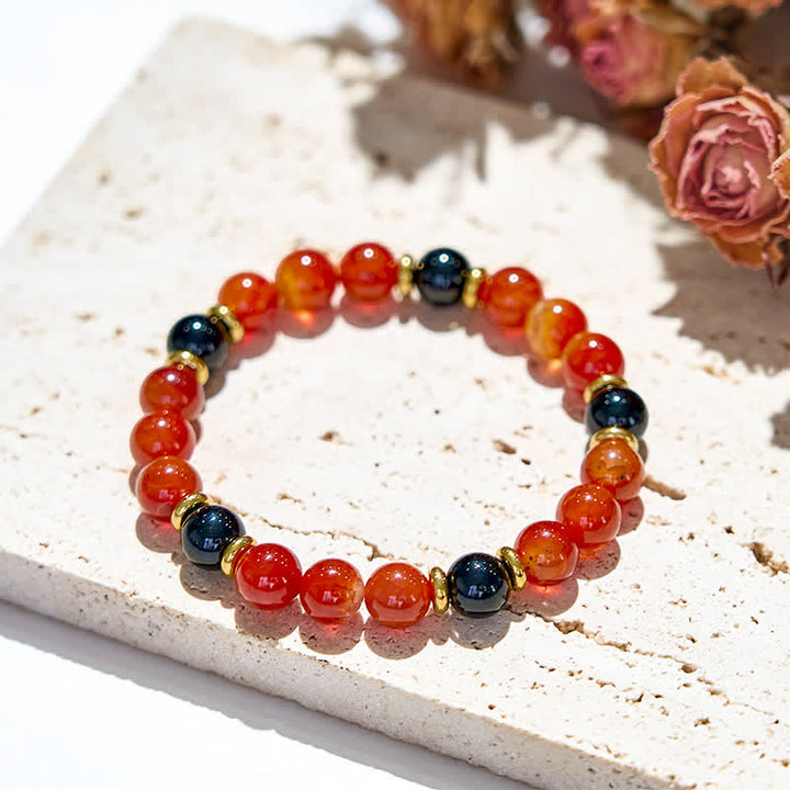 Bracelet en perles de quartz rubis naturel et onyx noir Olivenorma