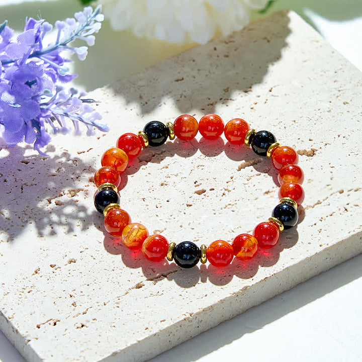 Bracelet en perles de quartz rubis naturel et onyx noir Olivenorma