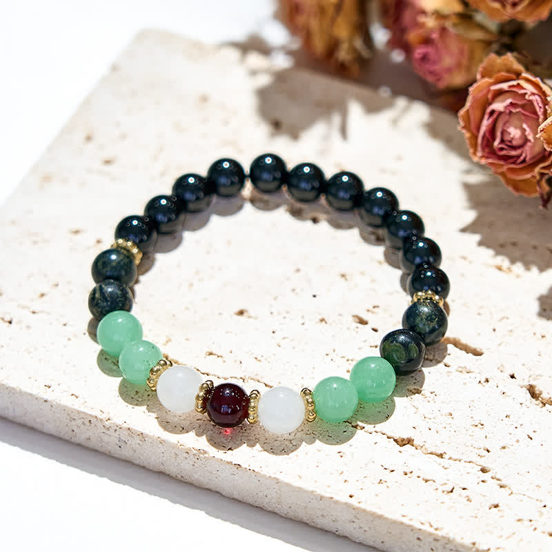 Bracelet en perles d'obsidienne et de grenat naturel Olivenorma