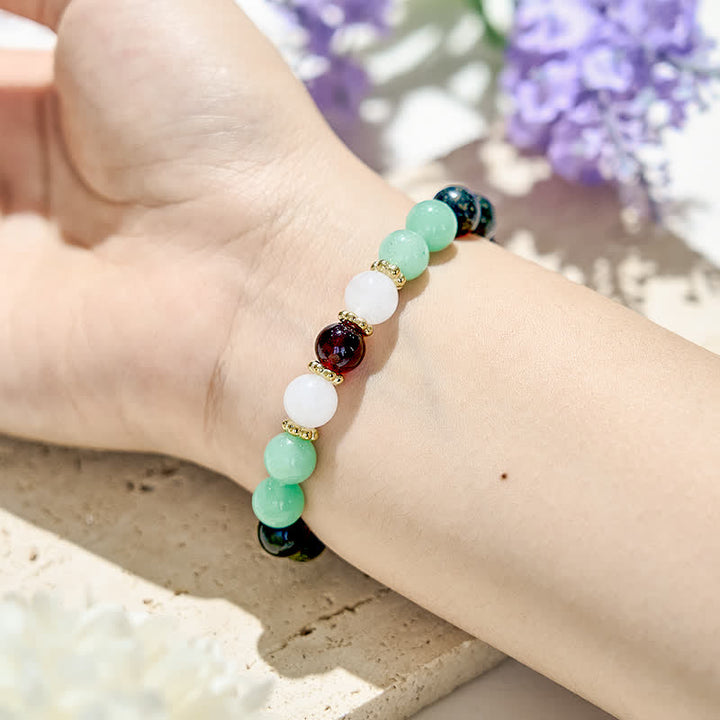 Bracelet en perles d'obsidienne et de grenat naturel Olivenorma