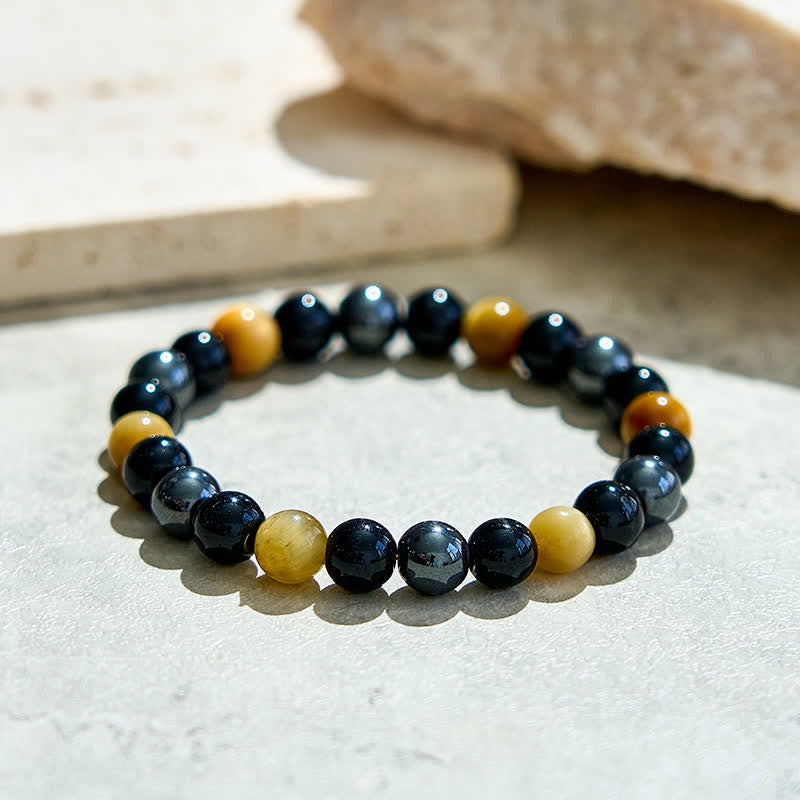 Bracelet de perles en hématite et obsidienne œil de tigre jaune Olivenorma
