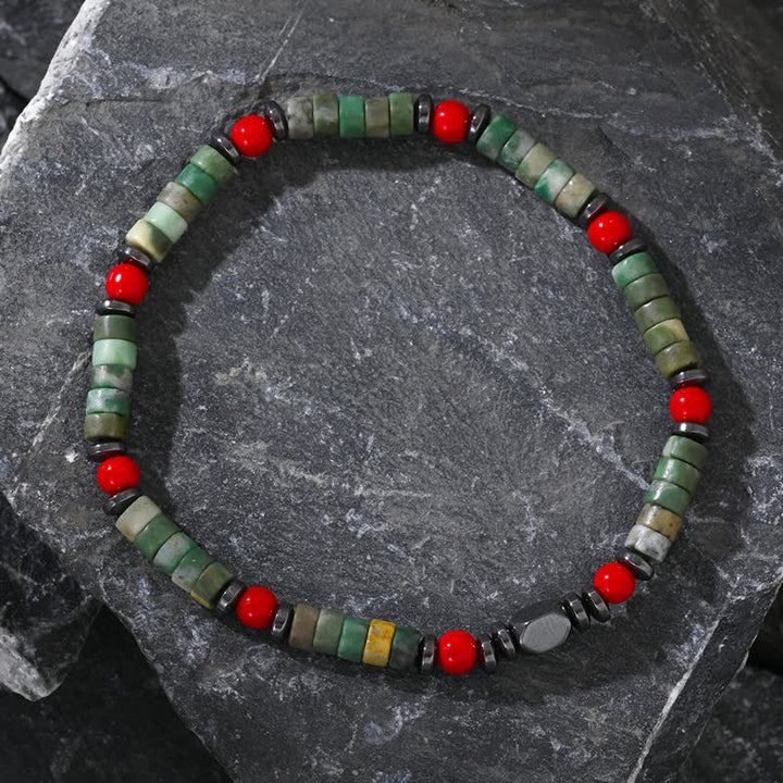 Bracelet Olivenorma en perles d'aventurine verte, d'hématite et de corail rouge