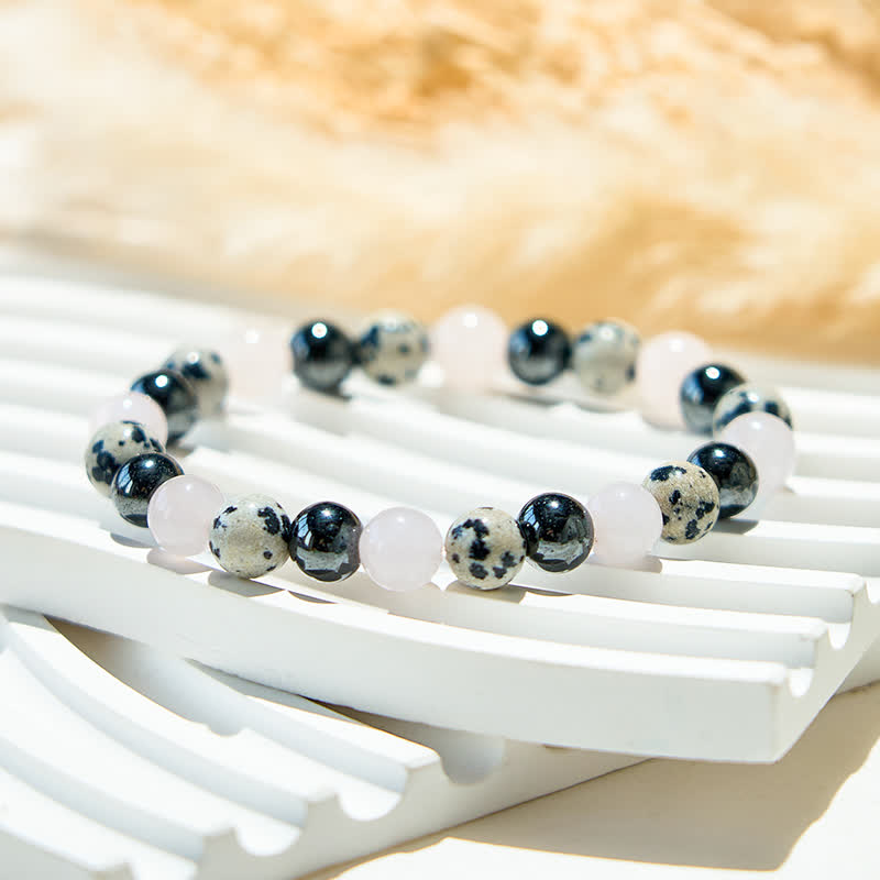 Bracelet en perles de quartz rose, jaspe dalmatien et hématite Olivenorma
