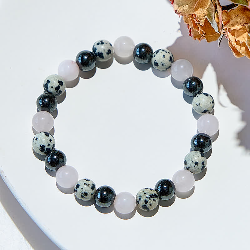 Bracelet en perles de quartz rose, jaspe dalmatien et hématite Olivenorma