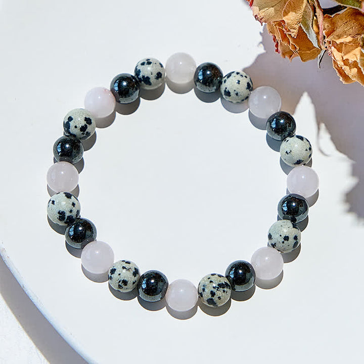 Bracelet en perles de quartz rose, jaspe dalmatien et hématite Olivenorma
