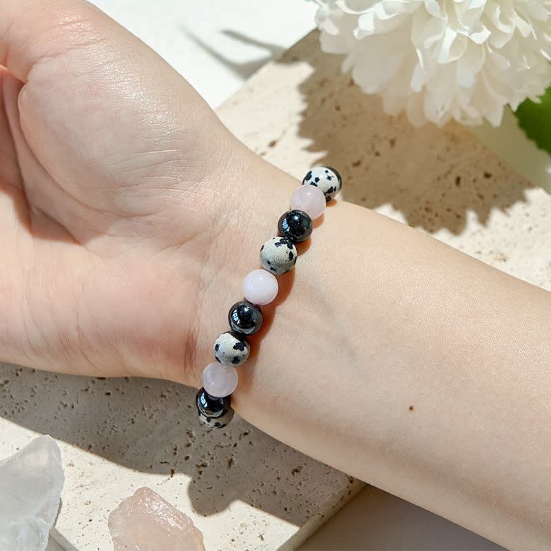 Bracelet en perles de quartz rose, jaspe dalmatien et hématite Olivenorma