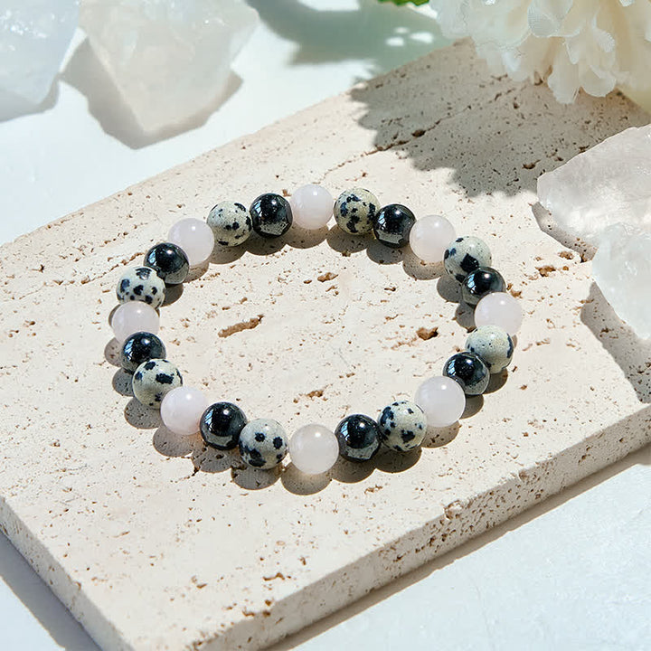 Bracelet en perles de quartz rose, jaspe dalmatien et hématite Olivenorma