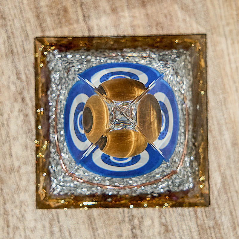 Symbole du mauvais œil Olivenorma Pyramide d'orgone en améthyste naturelle