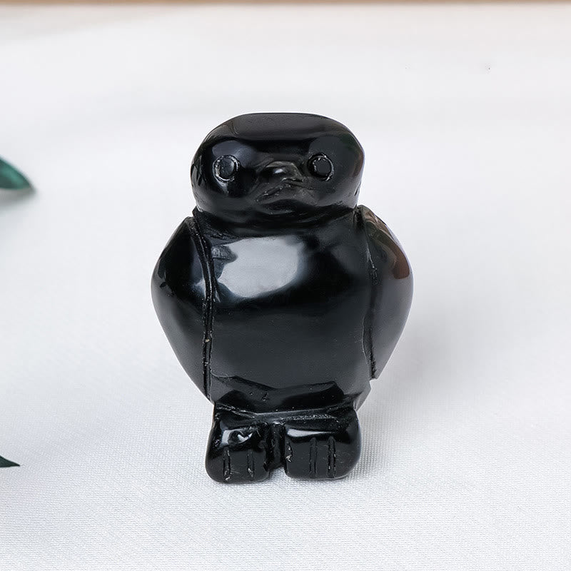 Décoration de pingouin en pierre brute gravée Olivenorma