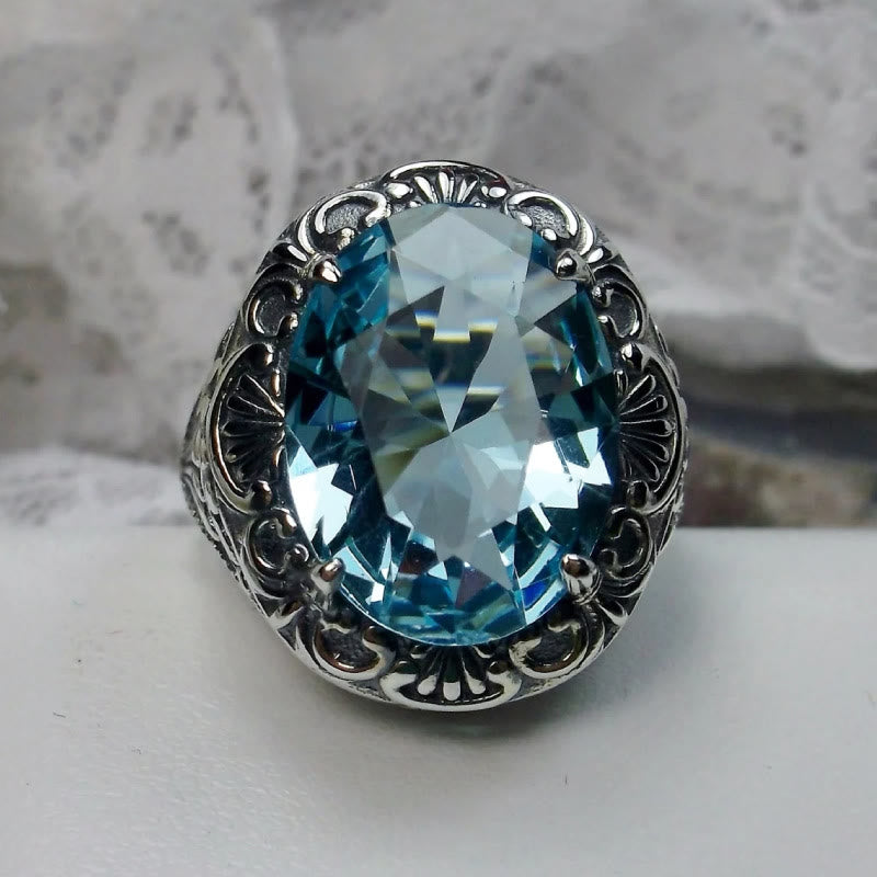 Bague rétro Olivenorma avec pierre précieuse sculptée à facettes aigue-marine