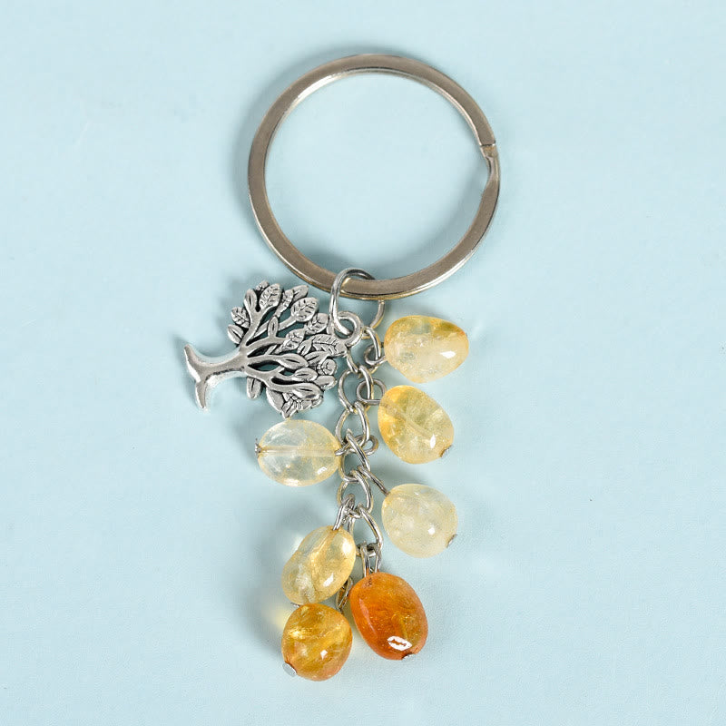 Porte-clés en pierre naturelle brute Olivenorma avec arbre de vie