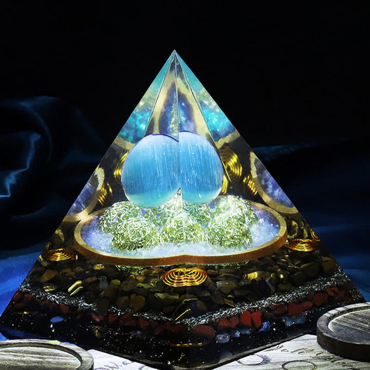 Pyramide d'orgone en pierre œil de chat bleu Olivenorma 14 cm