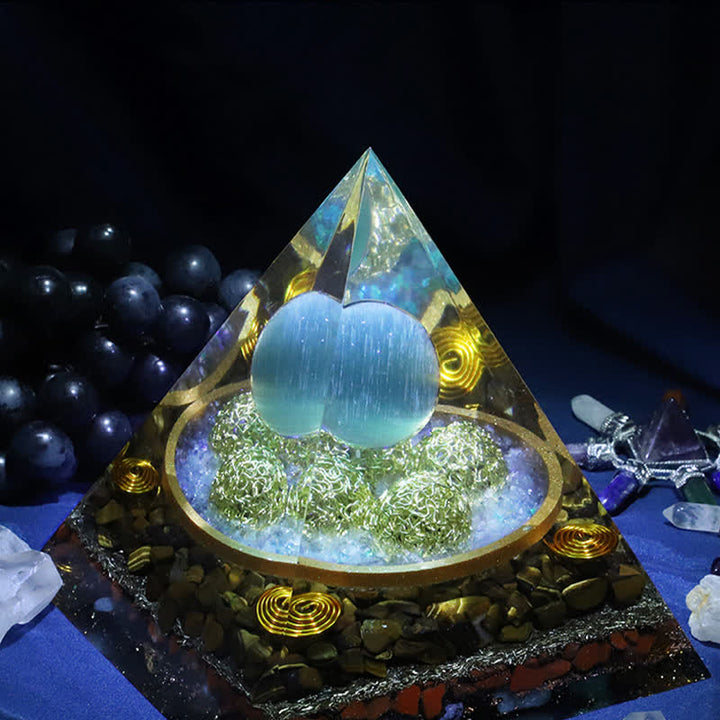 Pyramide d'orgone en pierre œil de chat bleu Olivenorma 14 cm