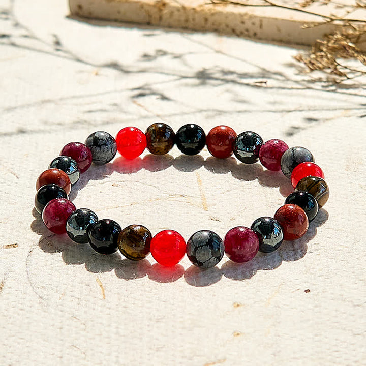 Bracelet de perles en obsidienne flocon de neige, hématite, rubis et quartz Olivenorma