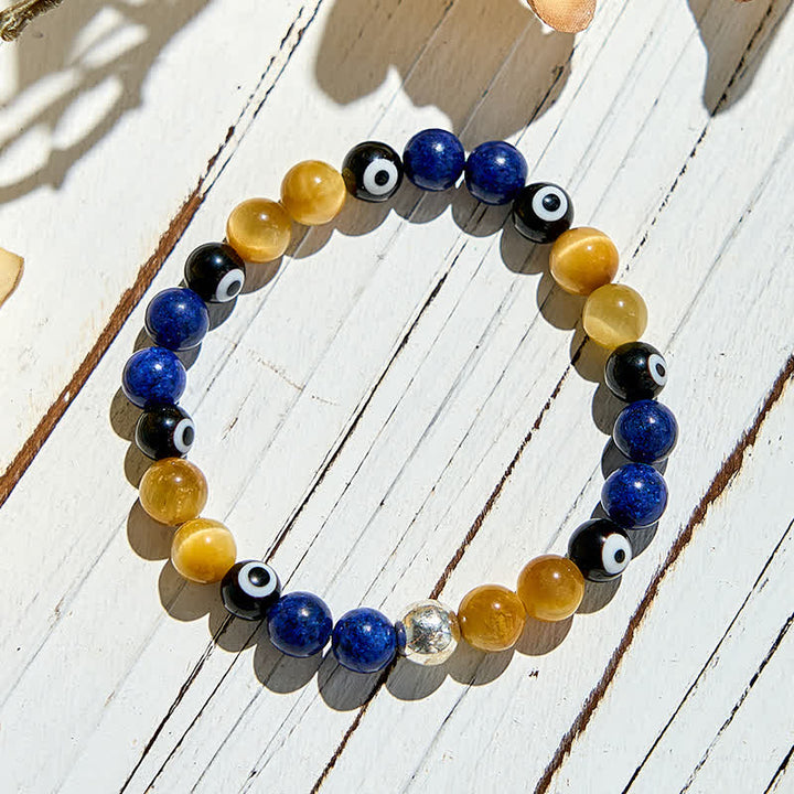 Bracelet de perles contre le mauvais œil en lapis-lazuli et œil de tigre Olivenorma