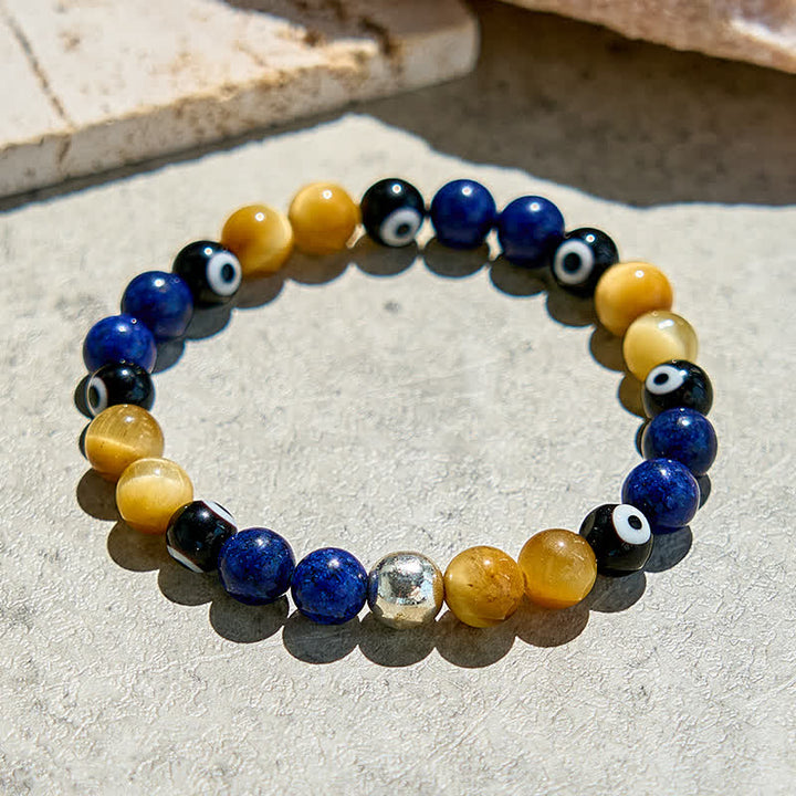 Bracelet de perles contre le mauvais œil en lapis-lazuli et œil de tigre Olivenorma