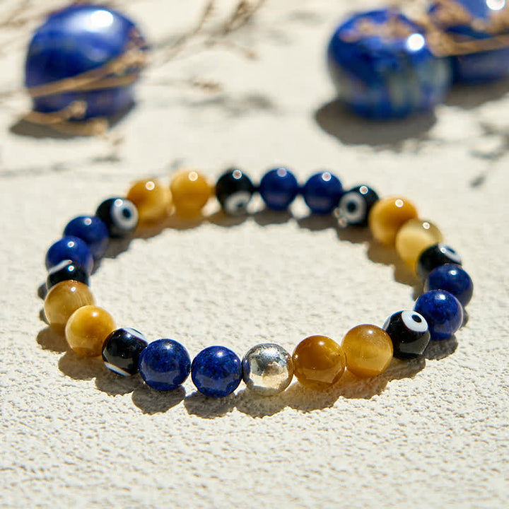 Bracelet de perles contre le mauvais œil en lapis-lazuli et œil de tigre Olivenorma