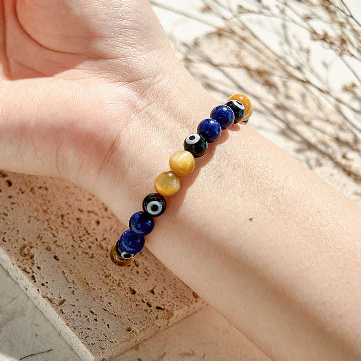 Bracelet de perles contre le mauvais œil en lapis-lazuli et œil de tigre Olivenorma