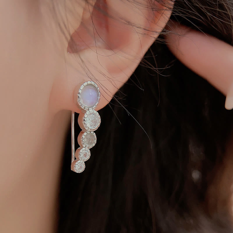 Boucles d'oreilles rondes en pierre de lune et zircon blanc Olivenorma