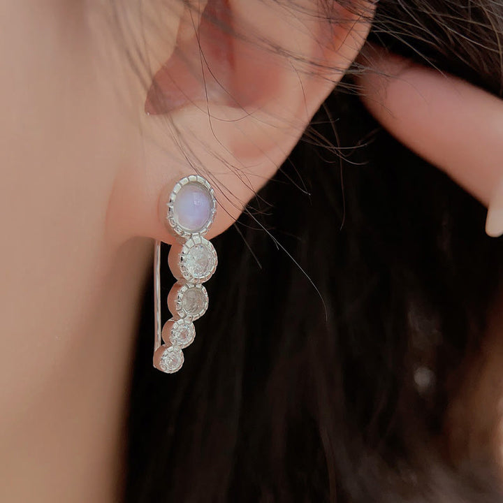 Boucles d'oreilles rondes en pierre de lune et zircon blanc Olivenorma