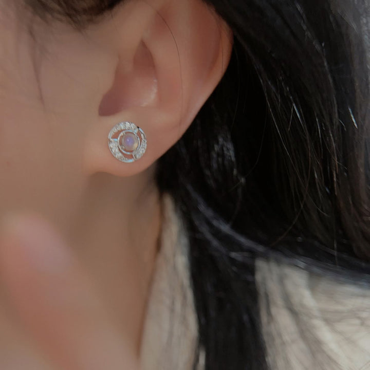 Boucles d'oreilles à tige en forme de tourbillon en pierre de lune Olivenorma