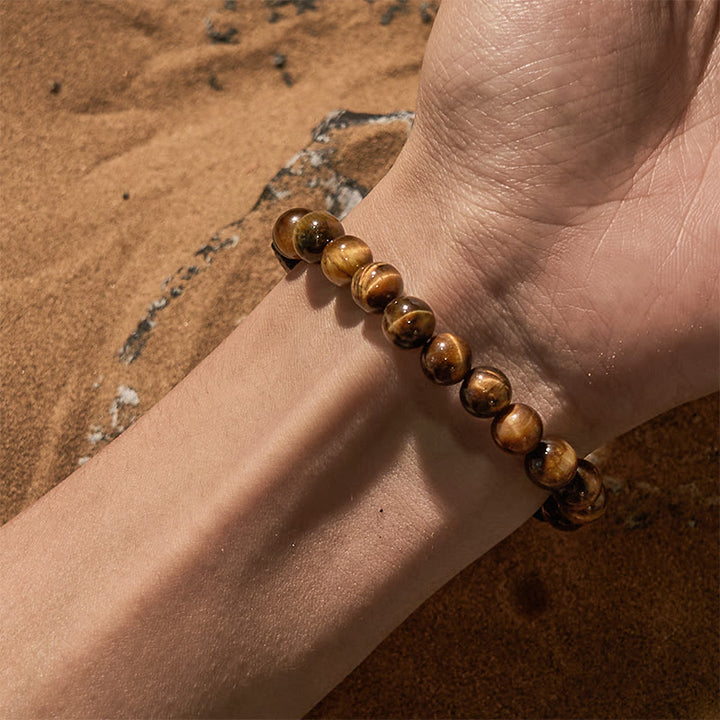 Bracelet en perles de pierre de lave et œil de tigre taillé en cube Olivenorma