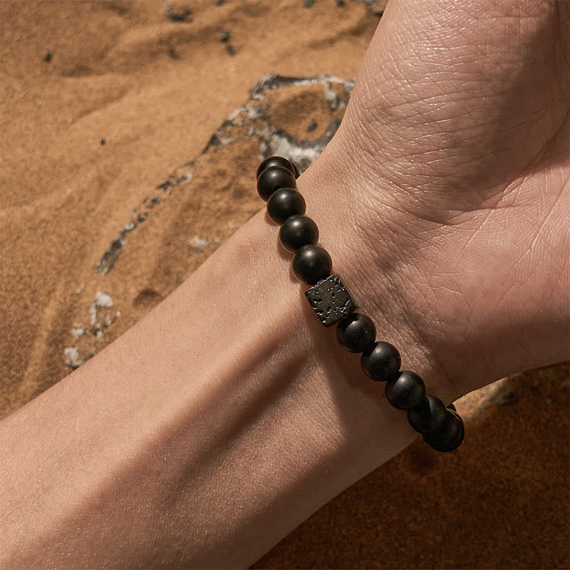 Bracelet Olivenorma en perles de pierre de lave et onyx noir 8 mm