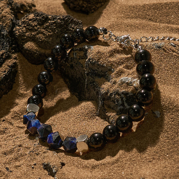 Bracelet en perles d'obsidienne œil de tigre bleu à facettes Olivenorma
