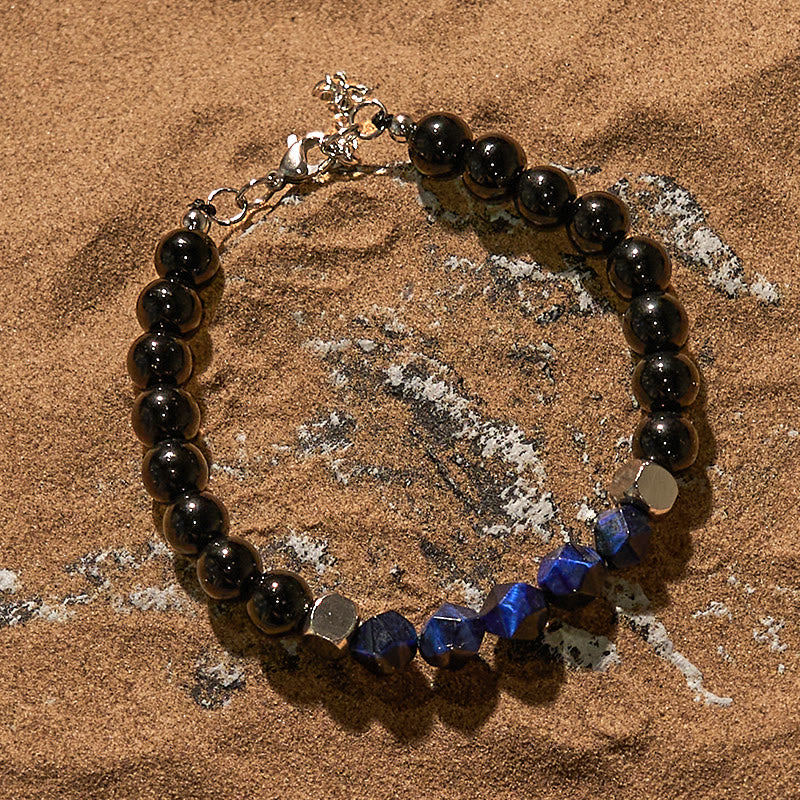 Bracelet en perles d'obsidienne œil de tigre bleu à facettes Olivenorma