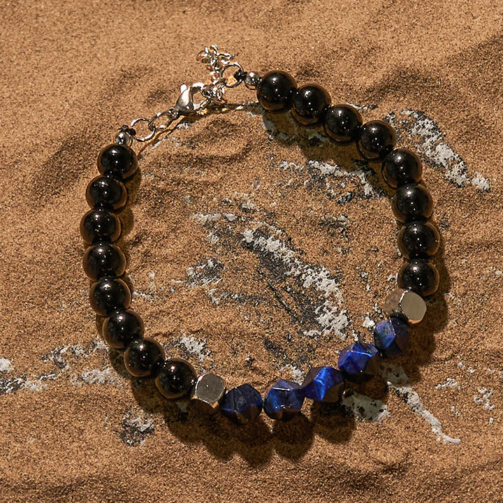 Bracelet en perles d'obsidienne œil de tigre bleu à facettes Olivenorma