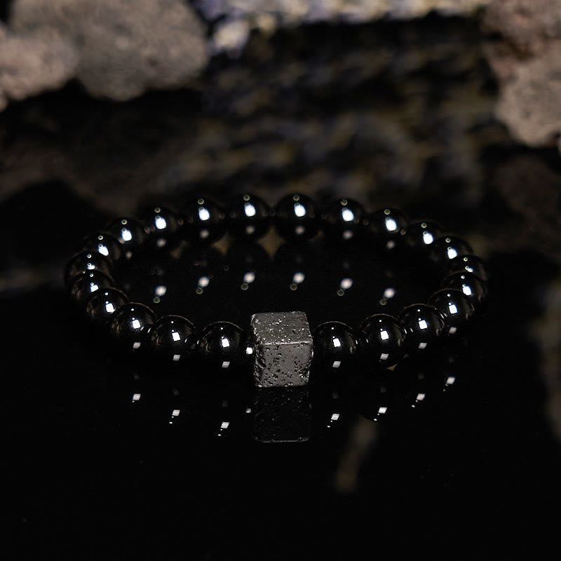 Bracelet en perles d'obsidienne en pierre de lave taillée en cube Olivenorma