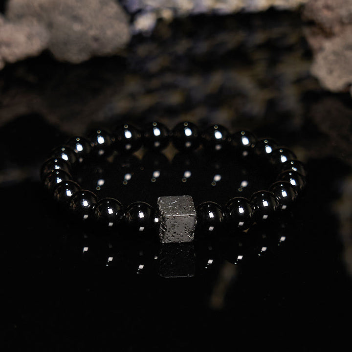 Bracelet en perles d'obsidienne en pierre de lave taillée en cube Olivenorma