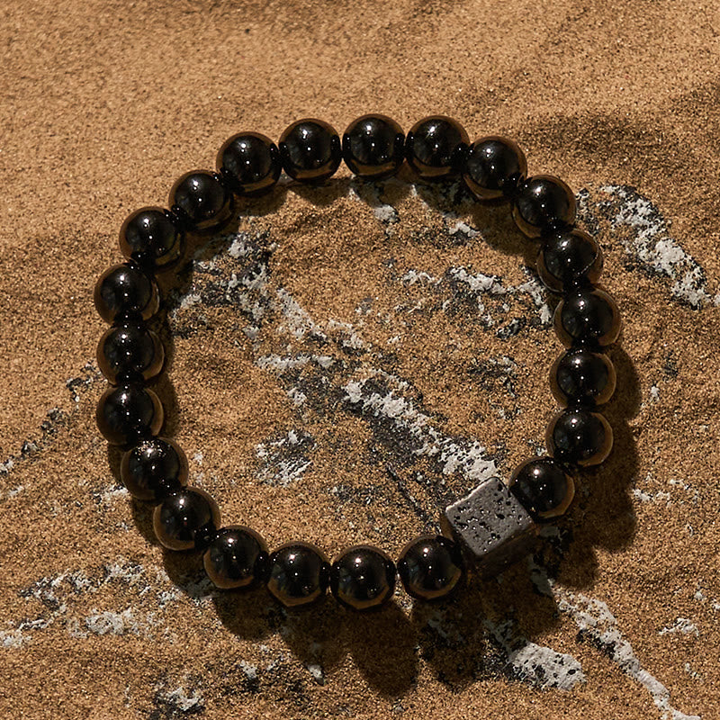 Bracelet en perles d'obsidienne en pierre de lave taillée en cube Olivenorma