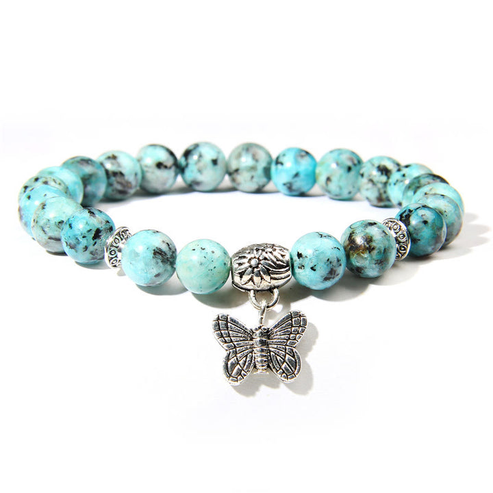 Bracelet à breloques papillon en turquoise naturelle Olivenorma