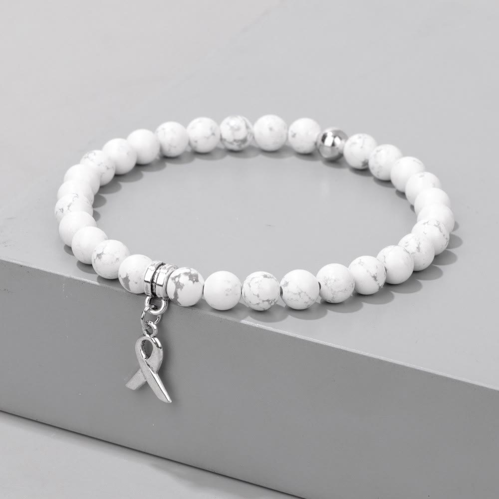 Bracelet porte-bonheur en perles de pierres précieuses naturelles avec breloque ruban Olivenorma