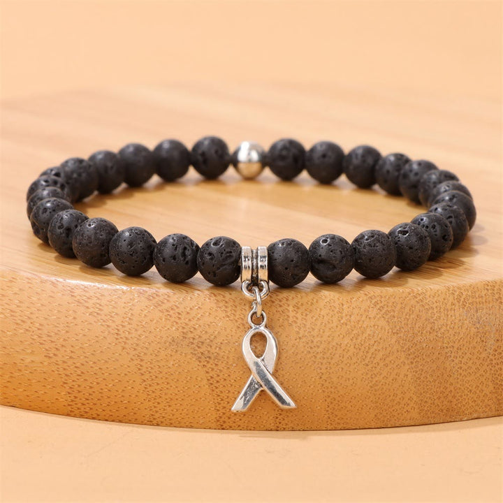 Bracelet porte-bonheur en perles de pierres précieuses naturelles avec breloque ruban Olivenorma