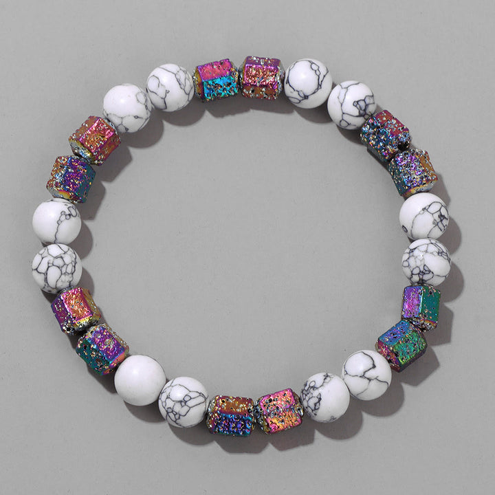 Bracelet en perles de pierre de lave géométriques pailletées Olivenorma