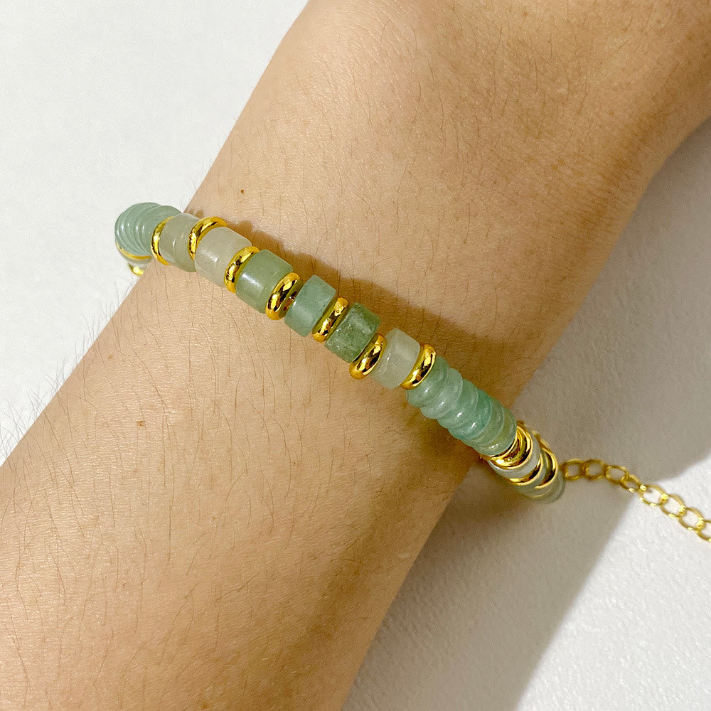 Bracelet en perles de pierres précieuses naturelles taillées à la roue Olivenorma