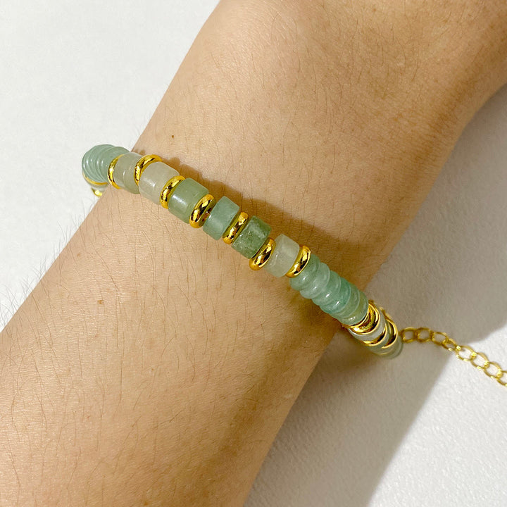 Bracelet en perles de pierres précieuses naturelles taillées à la roue Olivenorma