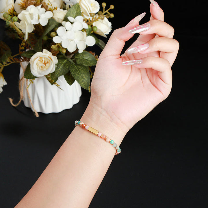 Bracelet en perles de pierres précieuses naturelles à taille cubique Olivenorma