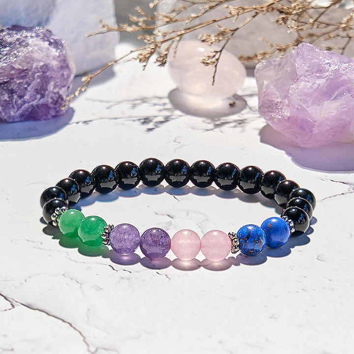 Bracelet de perles en obsidienne, lapis-lazuli et quartz rose Olivenorma