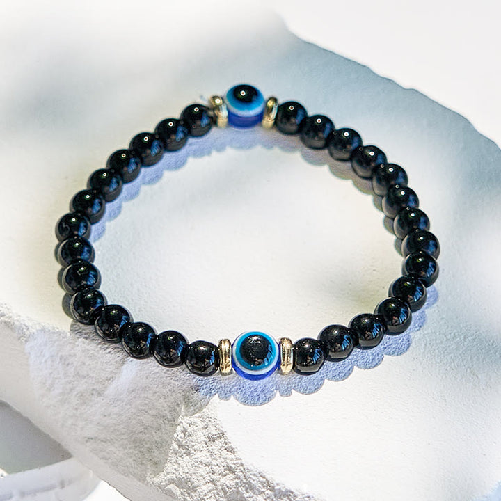 Bracelet de perles contre le mauvais œil en onyx noir naturel Olivenorma