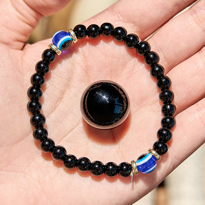 Bracelet de perles contre le mauvais œil en onyx noir naturel Olivenorma